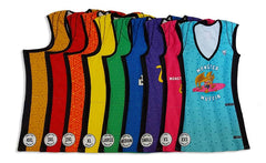 Jerseys laid out from 4XL to XXS in a rainbow of colours